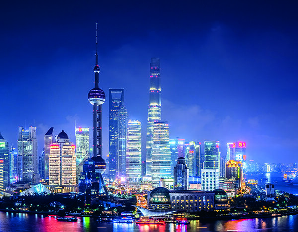Elevated view of Shanghai skyline at night.